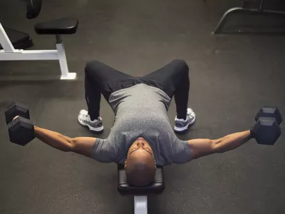 man with dumbbells