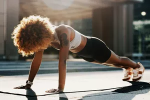 Strong woman in a plank