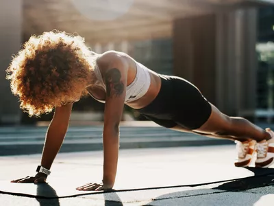 Strong woman in a plank
