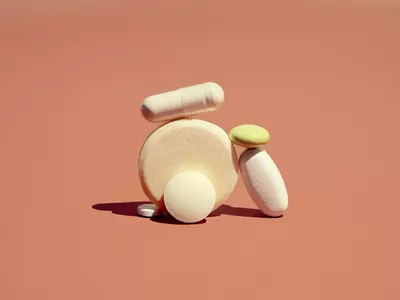 A group of pharmaceutical drugs pills laid in a pile