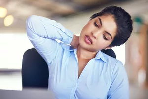 Woman with sore muscles