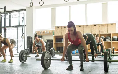 Group of people doing clean and press