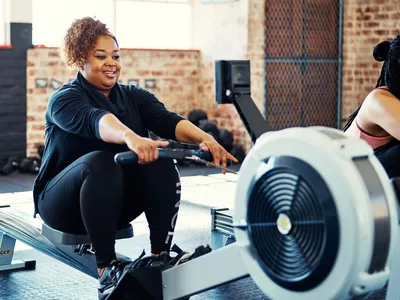 Women using rowing machine