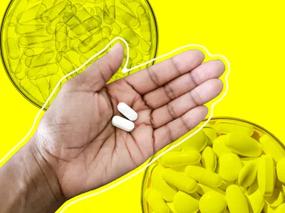 supplements in hand
