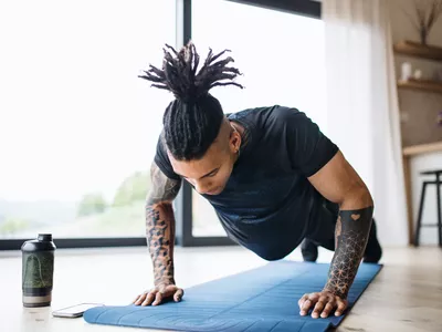Man doing push-ups at home