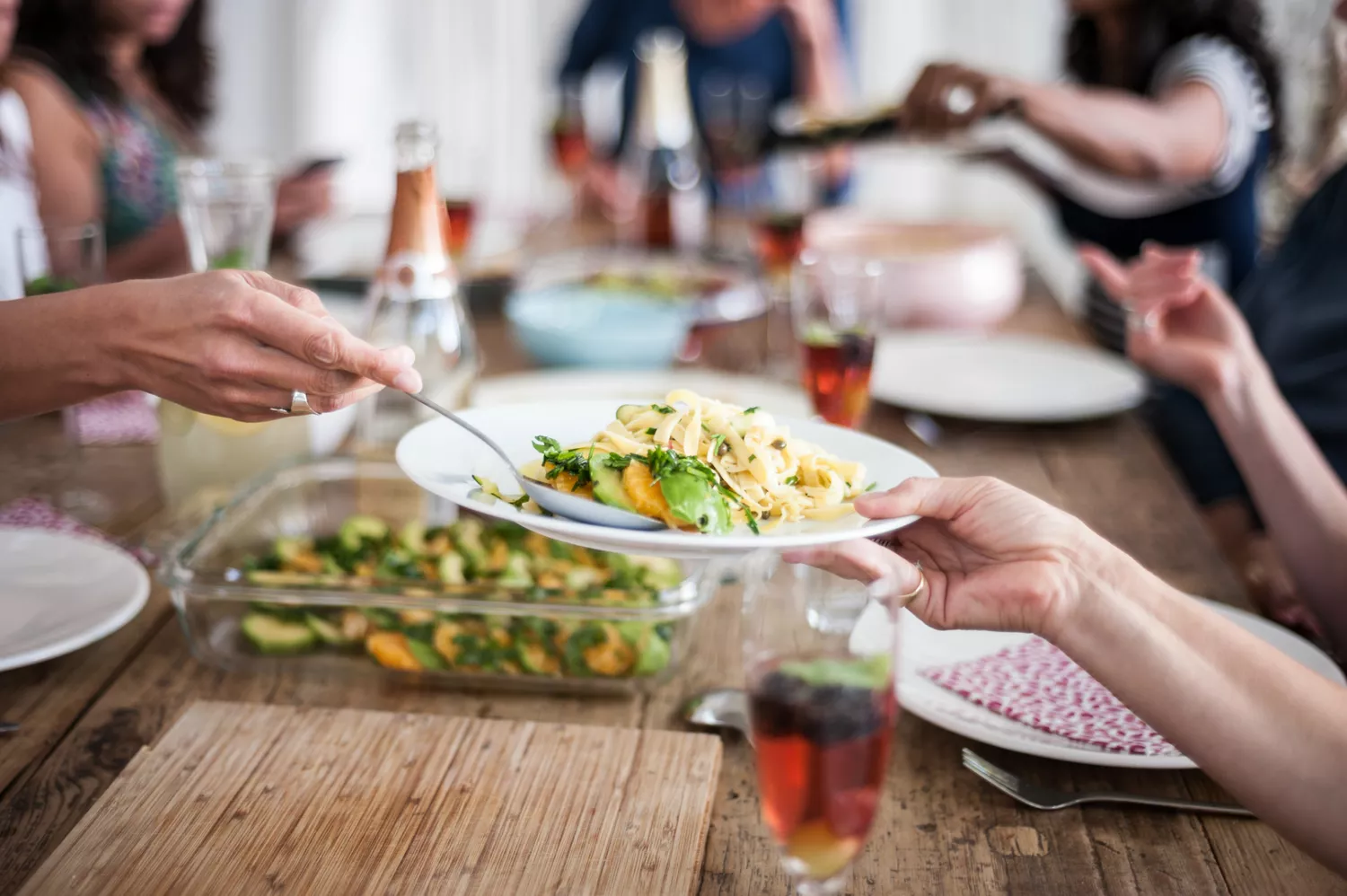 Scooping a portion onto a dinner plate