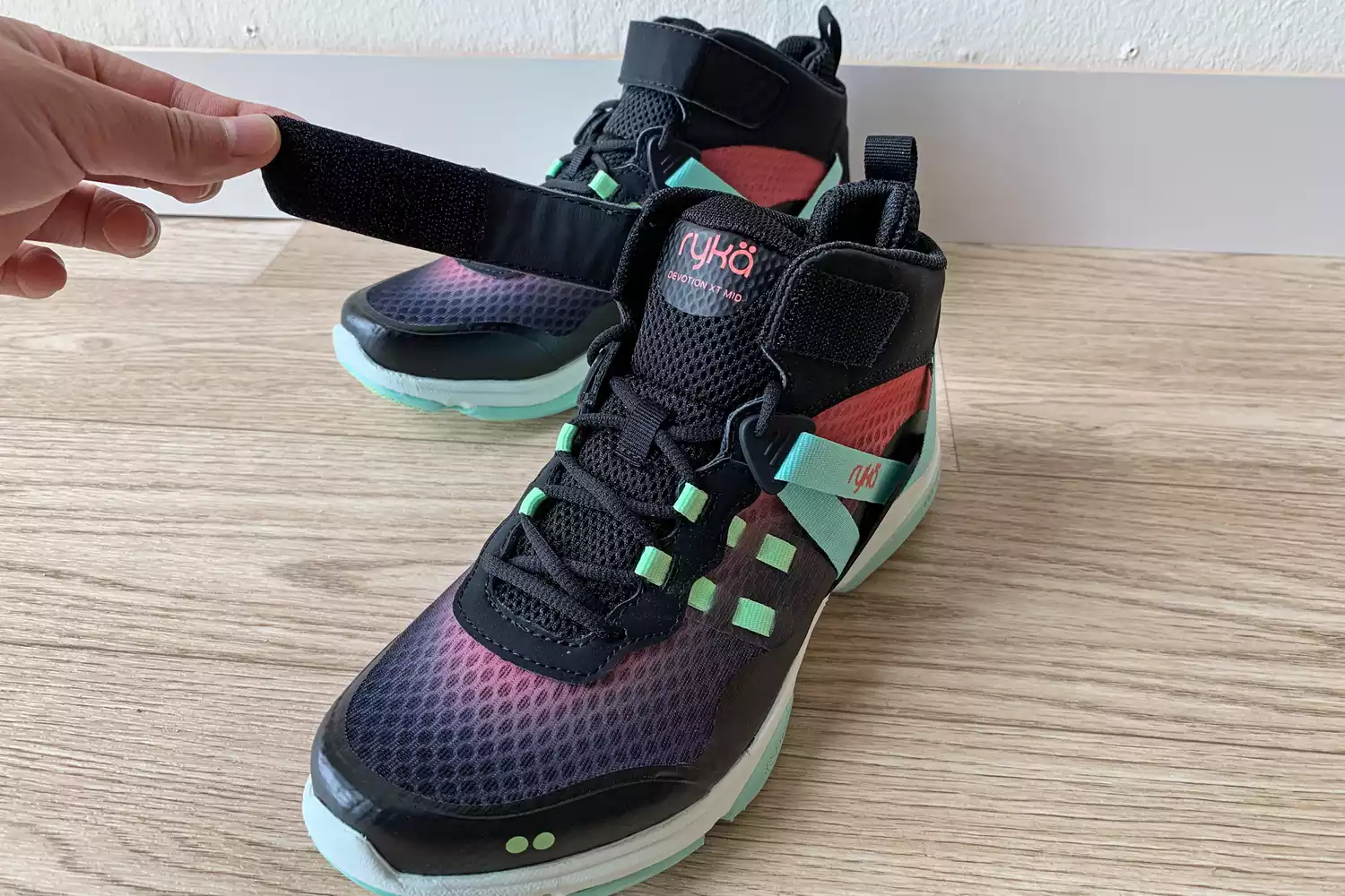 The Velcro strap on the top of the Ryka Devotion XT Mid Top Training Shoes