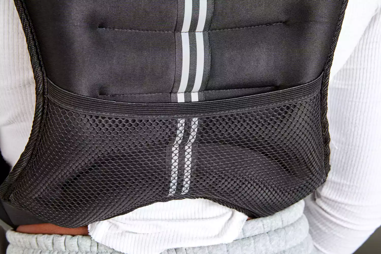 Close up of person wearing Prodigen Weighted Vest